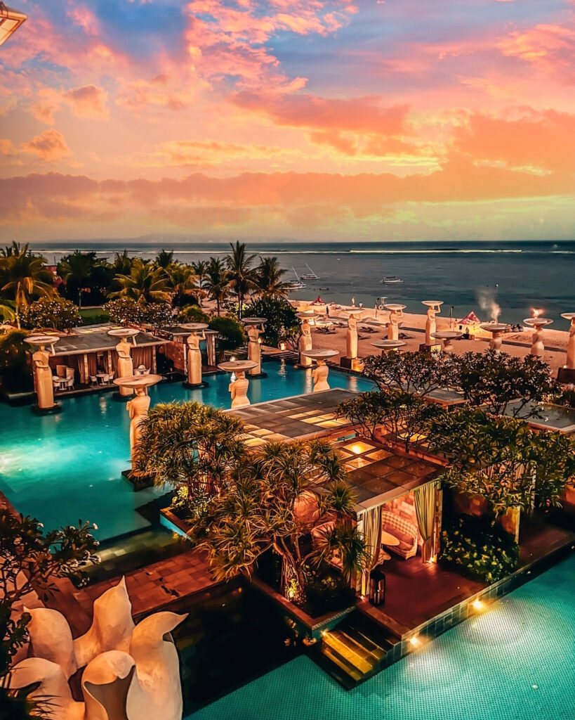 Mulia Resort Nusa Dua Bali — pool at sunset